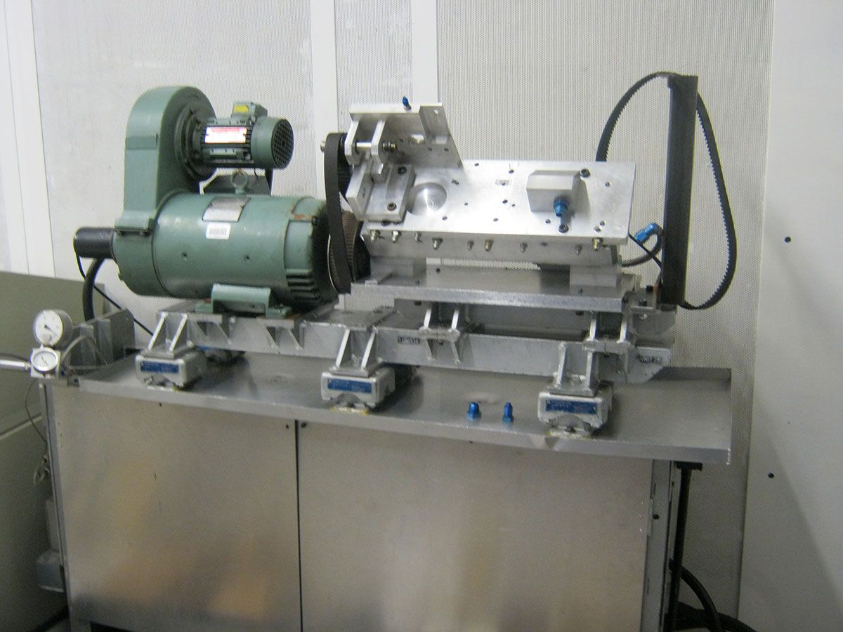 Cylinder head valvetrain testing rig